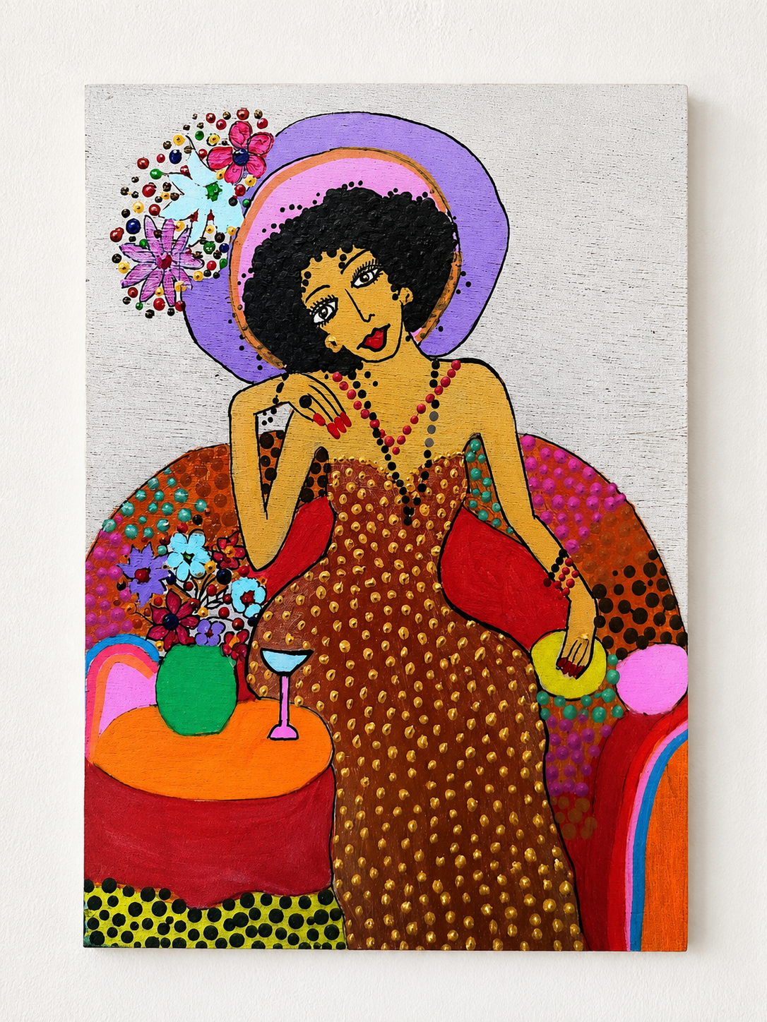 In Full Color — original painting on recycled wood of a woman in a colorful armchair with flowers, 15x20 cm, by Dalia Bar Shalom